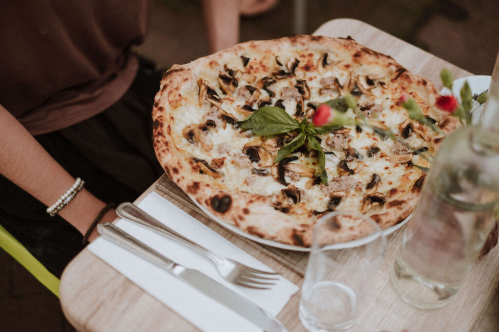 A wood-fired pizza fresh from the oven at Amalfi